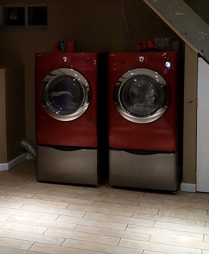 Red ASKO washer and dryer